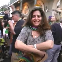 Sexy lady flashing her large breasts at Mardi Gras back in the day