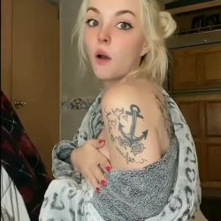 Young blonde went to show off her tattoo and ended up showing her chest